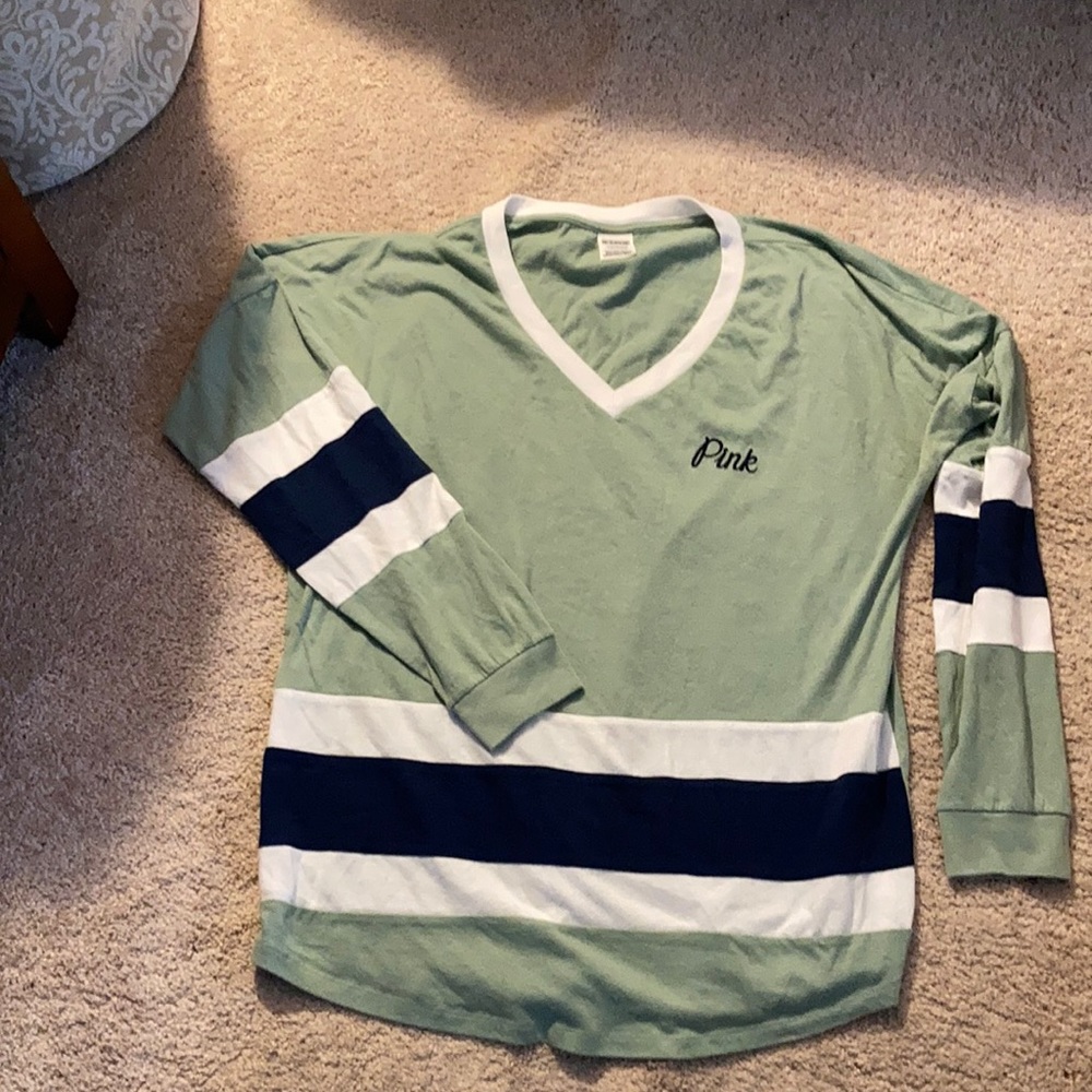 Pink Victoria’s Secret top.